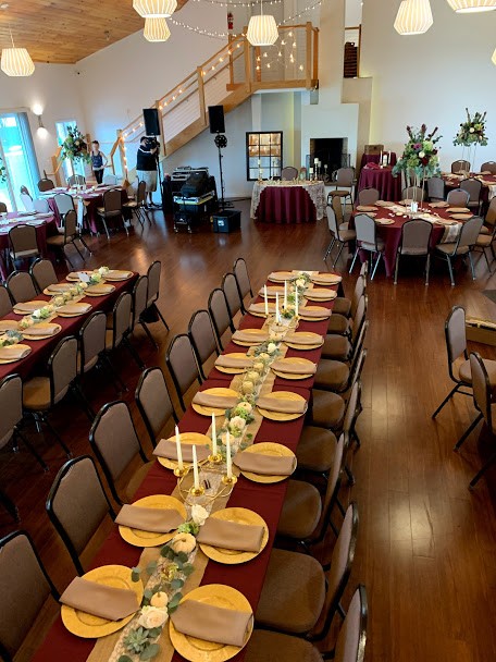 Long tables all set up inside Inn reception ballroom
