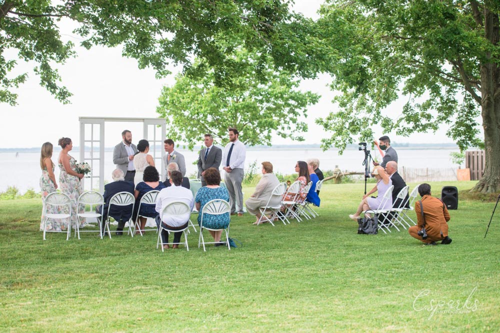 Wedding ceremony outdoor with sparse crowd due to coronavirus restrictions